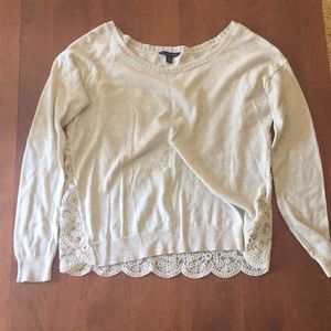 Light, cream colored sweater